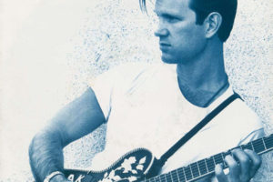 Chris Isaak | Imagen: Parte del arte de Blue hotel (1991)/Vinyl single